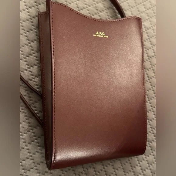 A.P.C. Jamie Neck Pouch crossbody purse in Vino